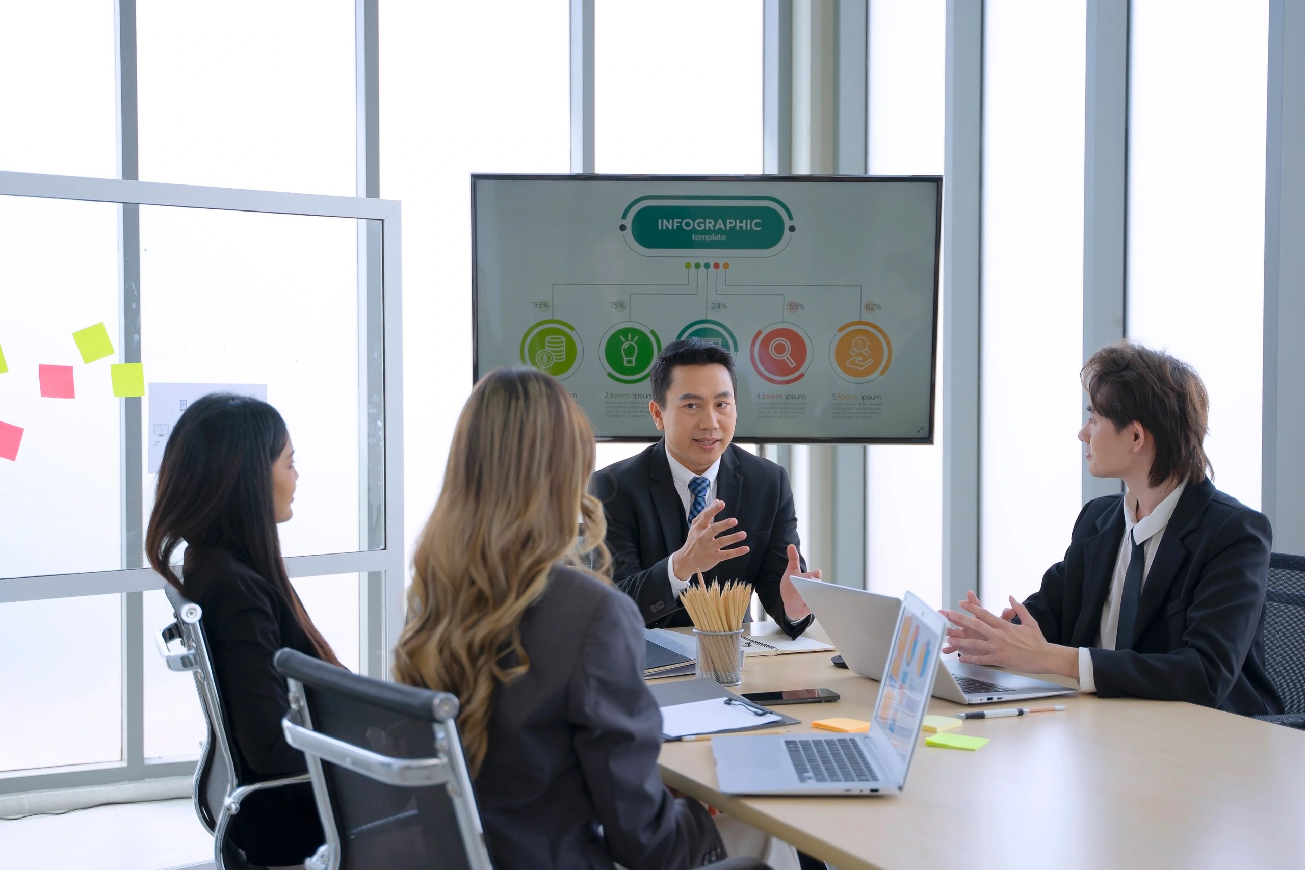 Consultants reviewing logistics strategy in a business meeting