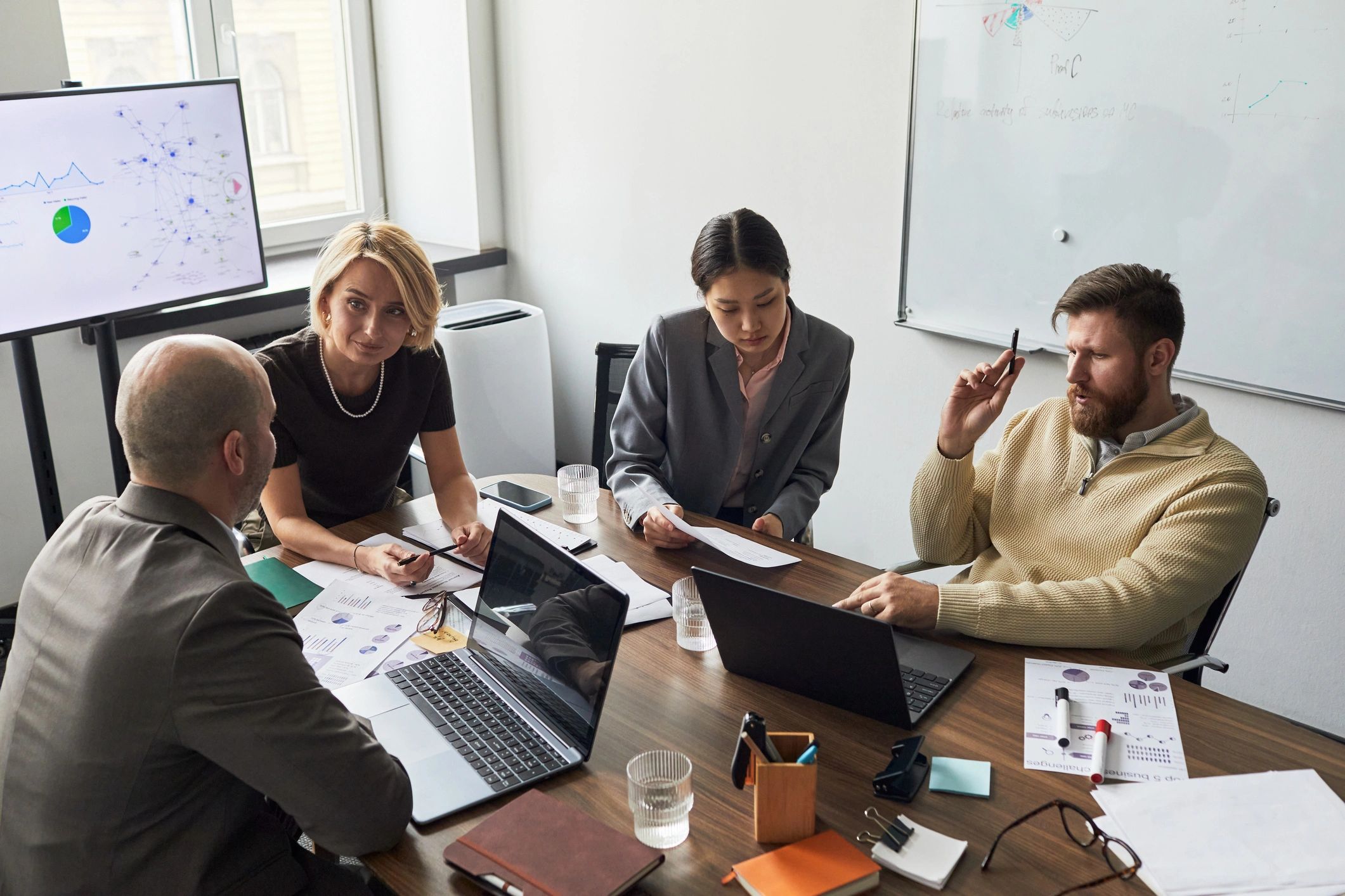Business team reviewing analytics during a strategy meeting